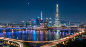 Modern Seoul skyline at night with Han River bridges illuminated