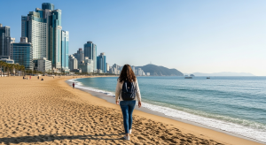 “Tourist walking along Busan Haeundae Beach safely”